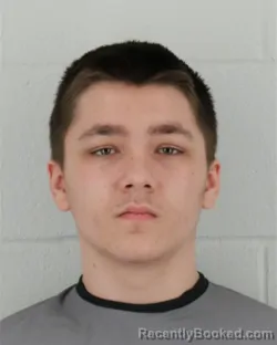 Mugshot of AUGUSTUS RUSSELL DEWY ALLEMAN booked in Johnson County, Kansas on March 25, 2026