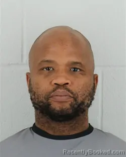 Mugshot of MARCUS DERRON DRIZZLE booked in Johnson County, Kansas on March 26, 2026