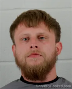 Mugshot of JUSTIN AARON WRIGHT booked in Johnson County, Kansas on March 27, 2026