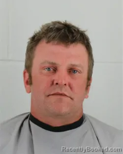 Mugshot of MICHAEL FINLEY MCSWEYN booked in Johnson County, Kansas on March 27, 2026