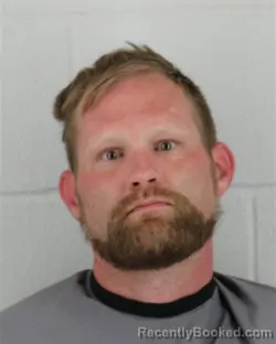 Mugshot of AUGUST LEE EICHELBERGER booked in Johnson County, Kansas on March 28, 2026