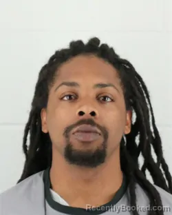 Mugshot of CHRISTIAN DAVION MORTON booked in Johnson County, Kansas on March 28, 2026