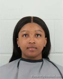 Mugshot of ANDREA CORRAE CULLORS booked in Johnson County, Kansas on March 28, 2026