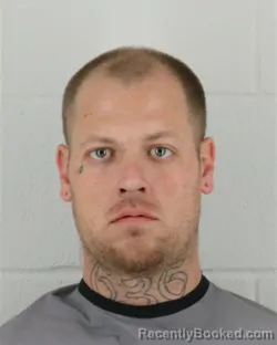 Mugshot of RYAN REGINALD THOMPSON booked in Johnson County, Kansas on March 28, 2026