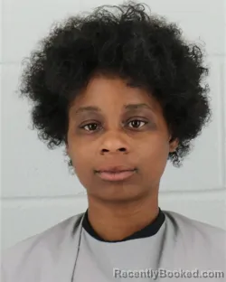 Mugshot of RANEISHA JANEE HAMPTON booked in Johnson County, Kansas on March 30, 2026