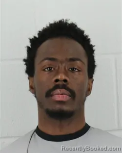 Mugshot of MORTEZ DSEAN PHILLIPS booked in Johnson County, Kansas on March 30, 2026