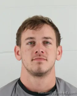 Mugshot of AUSTIN JAMIASON COOK booked in Johnson County, Kansas on March 30, 2026