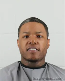 Mugshot of ANDREW LARRY CORDELL MOORE booked in Johnson County, Kansas on March 31, 2026