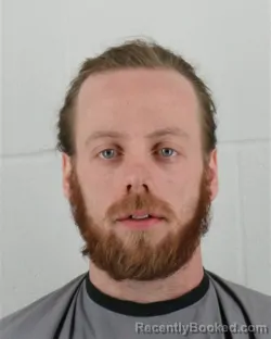 Mugshot of CHRISTIAN MICHAEL BROGDON booked in Johnson County, Kansas on March 31, 2026