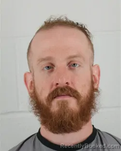 Mugshot of THAER NESER ALDIN BENKHADRA booked in Johnson County, Kansas on March 31, 2026