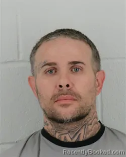 Mugshot of DUSTIN IAN LANE booked in Johnson County, Kansas on March 31, 2026