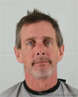 Mugshot of ROBERT JAMES NICKELSON booked in Johnson County, Kansas on March 31, 2026