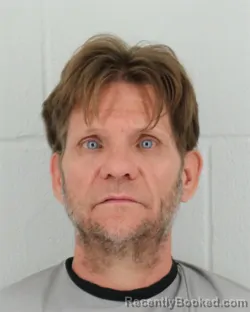 Mugshot of CHUCK MATHIS POWE booked in Johnson County, Kansas on March 31, 2026