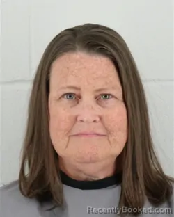 Mugshot of HEATHER JAN GRIMES booked in Johnson County, Kansas on April 1, 2026
