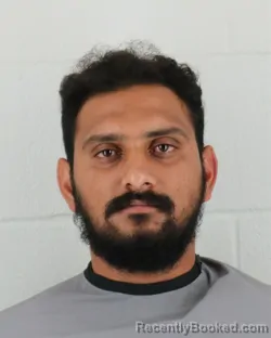 Mugshot of SRAVAN KUMAR AVVARU booked in Johnson County, Kansas on April 1, 2026