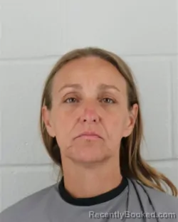 Mugshot of AMBER LOU HOWE booked in Johnson County, Kansas on April 1, 2026