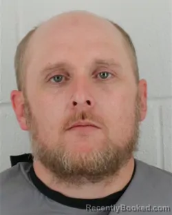 Mugshot of NATHAN CHARLES CRIST booked in Johnson County, Kansas on April 2, 2026