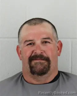 Mugshot of DAVID ROSS KENNEY booked in Johnson County, Kansas on April 2, 2026