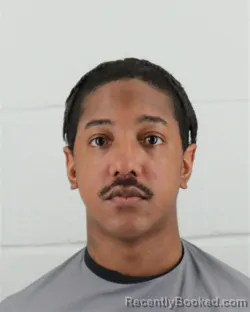 Mugshot of ALVIN TYRONE ALVARADO booked in Johnson County, Kansas on April 2, 2026