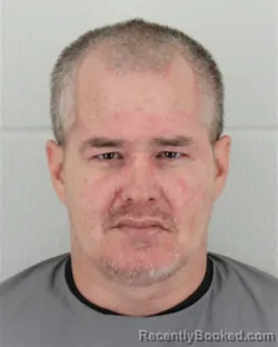 Mugshot of JOHN MICHAEL PADILLA booked in Johnson County, Kansas on April 2, 2026