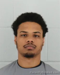 Mugshot of DAVON BENJAMIN MOORE booked in Johnson County, Kansas on April 2, 2026