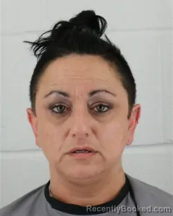 Mugshot of MARY CAROLINE DEVLIN booked in Johnson County, Kansas on April 3, 2026