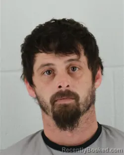 Mugshot of AUSTIN MICHAEL BROUHARD booked in Johnson County, Kansas on April 3, 2026