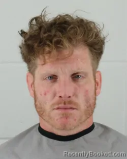 Mugshot of JOSHUA TYLER HERRON booked in Johnson County, Kansas on April 4, 2026