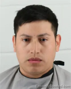 Mugshot of RICARDO MARTINEZ-ALBINO booked in Johnson County, Kansas on April 5, 2026