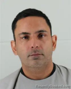 Mugshot of JAY KUMAR booked in Johnson County, Kansas on April 5, 2026