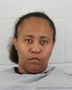 Mugshot of MICHELLE ALYCE CARNES booked in Johnson County, Kansas on April 25, 2026