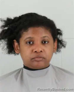 Mugshot of GYNON LOTOYA BROWN booked in Johnson County, Kansas on April 25, 2026