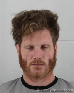 Mugshot of JOSHUA TYLER HERRON booked in Johnson County, Kansas on April 28, 2026