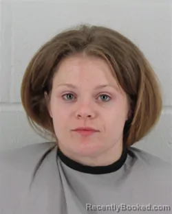 Mugshot of REGINA LEE CANO booked in Johnson County, Kansas on April 30, 2026