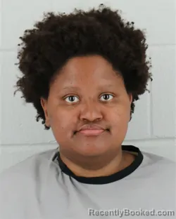 Mugshot of AALIYAH MWENDE MCRAE booked in Johnson County, Kansas on May 4, 2026