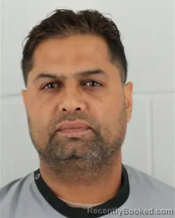 Mugshot of CHARANJIT SINGH booked in Johnson County, Kansas on May 8, 2026