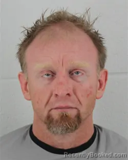 Mugshot of JOSHUA ADAM RANSDELL booked in Johnson County, Kansas on May 8, 2026