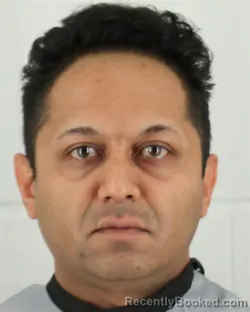 Mugshot of SAMIR BHARAT GOVIND booked in Johnson County, Kansas on May 11, 2026