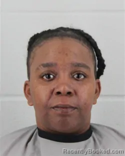 Mugshot of ANTOINETTE DENISE BAYLISS booked in Johnson County, Kansas on May 13, 2026
