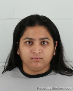 Mugshot of SARA BEGUM booked in Johnson County, Kansas on May 14, 2026