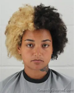 Mugshot of BRIANNA NOEL ALEXIS BRAUN booked in Johnson County, Kansas on May 19, 2026