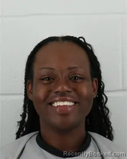 Mugshot of TREASURE DOMINIQUE JACKSON booked in Johnson County, Kansas on May 20, 2026