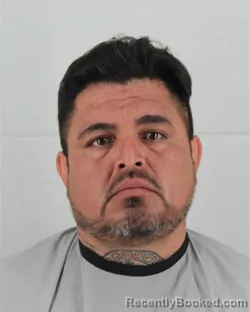 Mugshot of ADAN POSADAS-GONZALEZ booked in Johnson County, Kansas on May 22, 2026