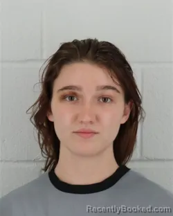 Mugshot of MEGAN MOBERLY TRENT booked in Johnson County, Kansas on June 21, 2026