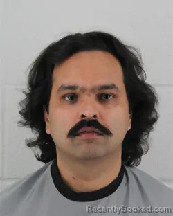 Mugshot of ARSLAN ZAFAR HASHMI booked in Johnson County, Kansas on June 21, 2026