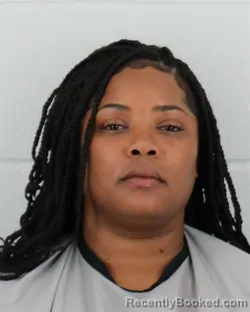 Mugshot of DOMONIQUE MARIE TAYLOR booked in Johnson County, Kansas on June 23, 2026