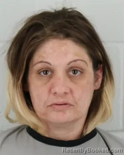 Mugshot of ANDREA ELISE DEMBOSKI booked in Johnson County, Kansas on June 23, 2026