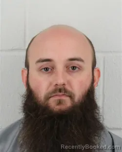 Mugshot of MICAH AIDAN DOUGHTY booked in Johnson County, Kansas on July 1, 2026