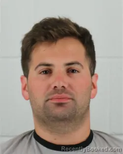 Mugshot of JOSEPH BRUNO ALPHONSE SCHUTZMAN booked in Johnson County, Kansas on July 5, 2026