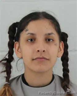 Mugshot of KARINA RUBY MUNOZ booked in Johnson County, Kansas on July 7, 2026